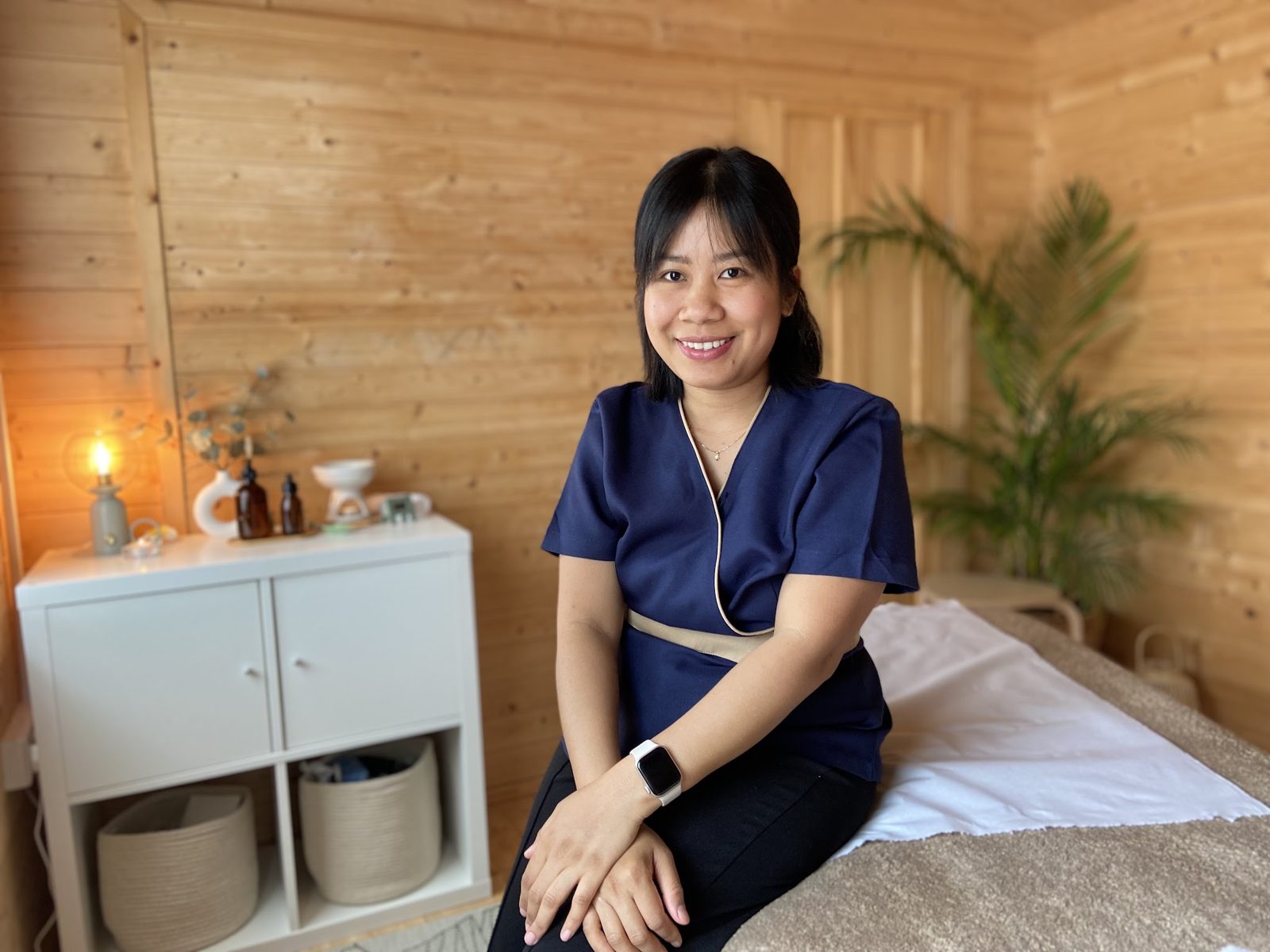 Our massage therapist in the treatment room at Tulip House